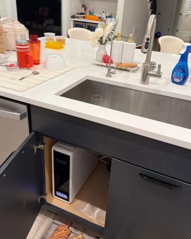 Reverse osmosis system installed under a kitchen island sink